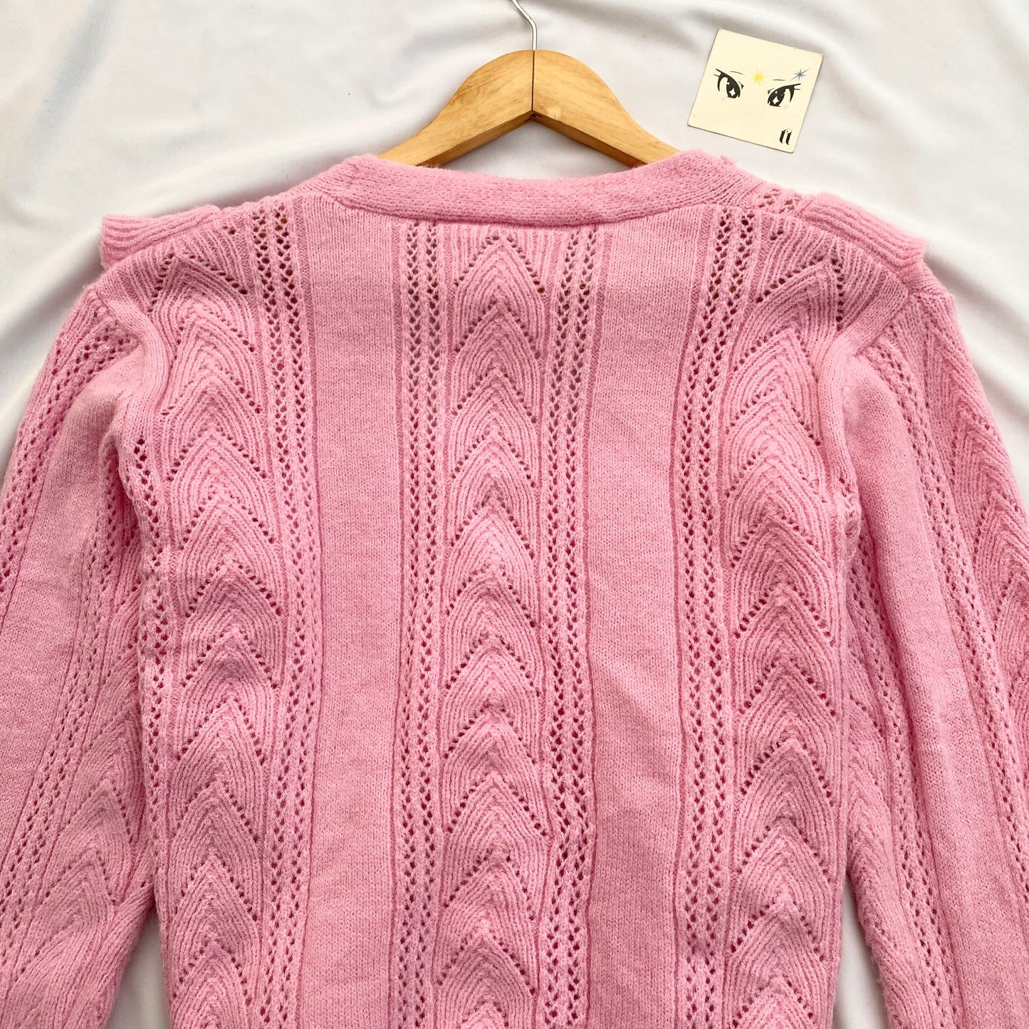 PINK KNIT WITH FRILLY DETAILS