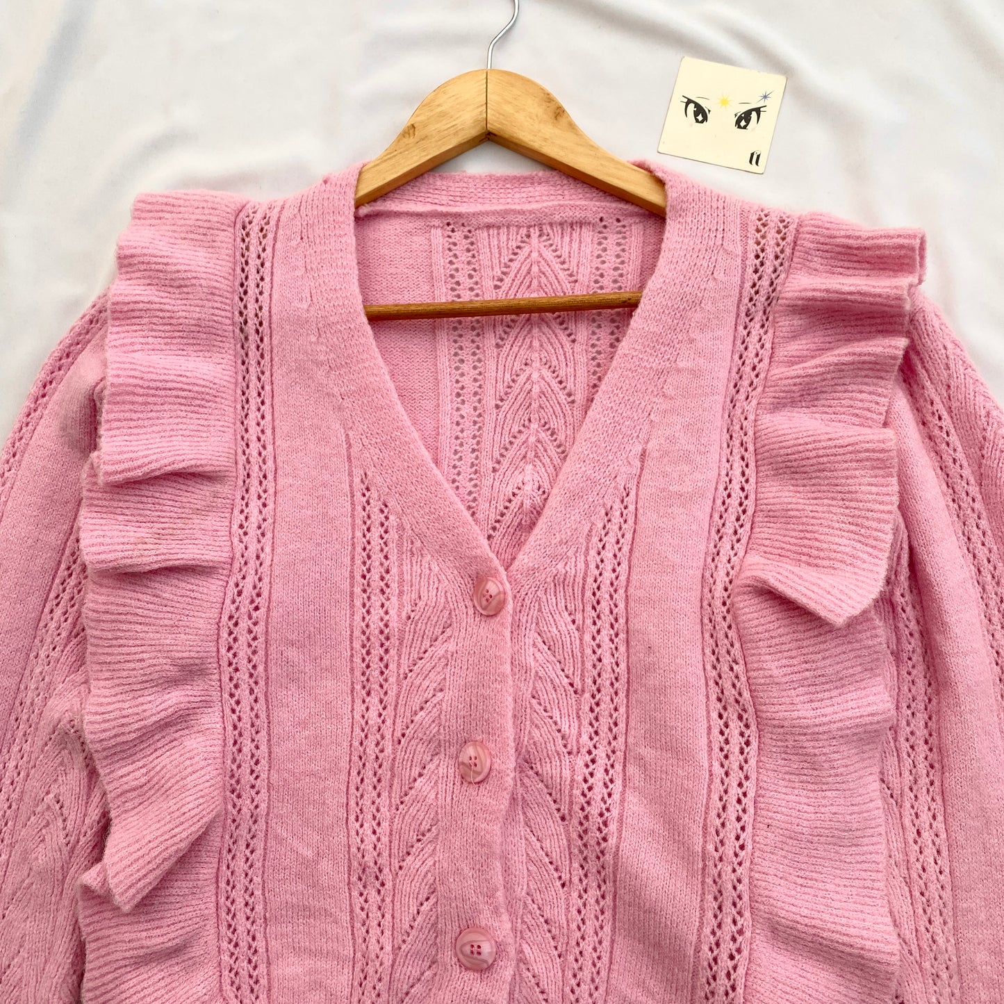 PINK KNIT WITH FRILLY DETAILS