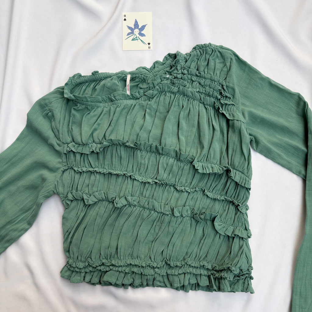 GREEN ASYMMETRIC RUFFLE TOP FROM FREE PEOPLE