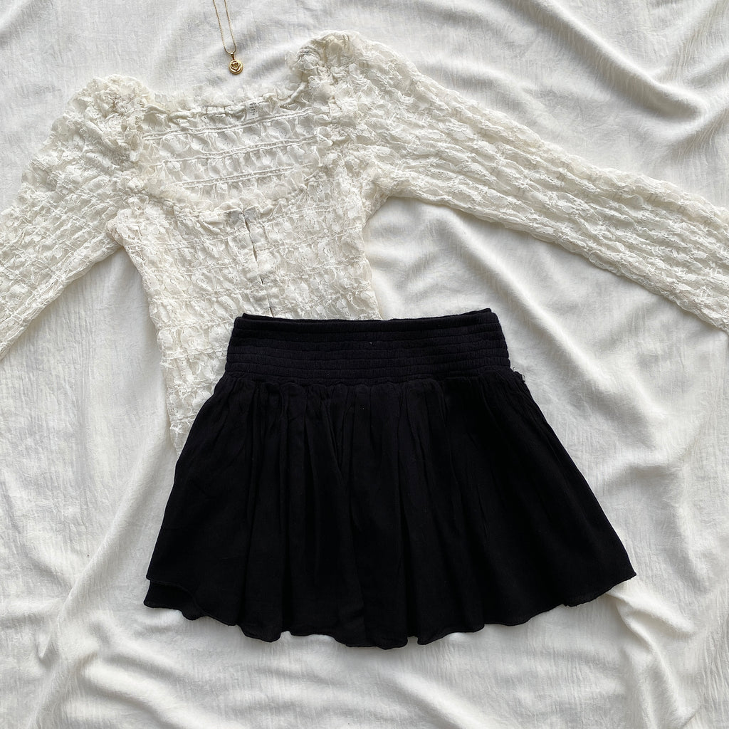 BLACK SKIRT WITH EMBROIDERED BAND FROM RIPCURL (Waist : 22-26)