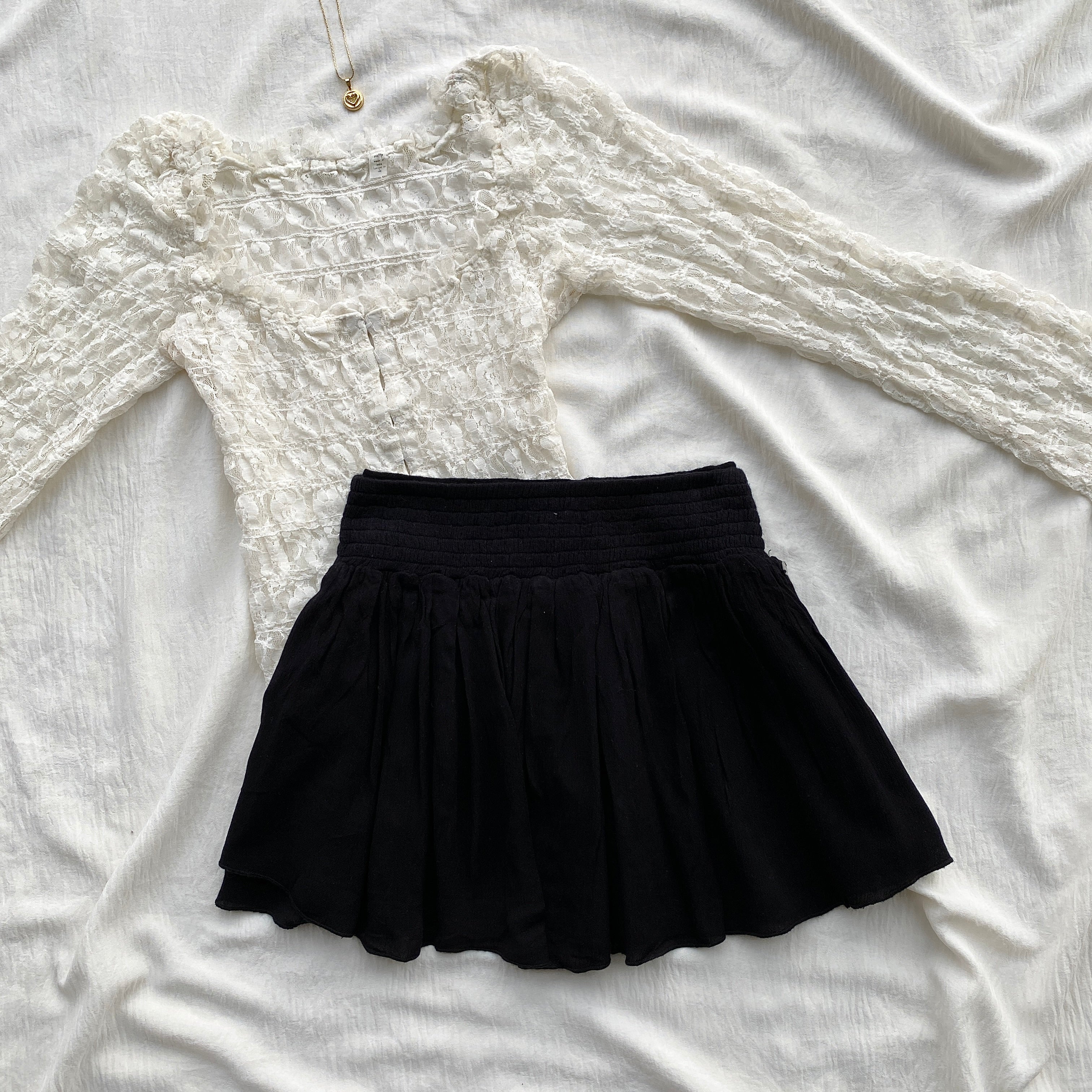 BLACK SKIRT WITH EMBROIDERED BAND FROM RIPCURL (Waist : 22-26)