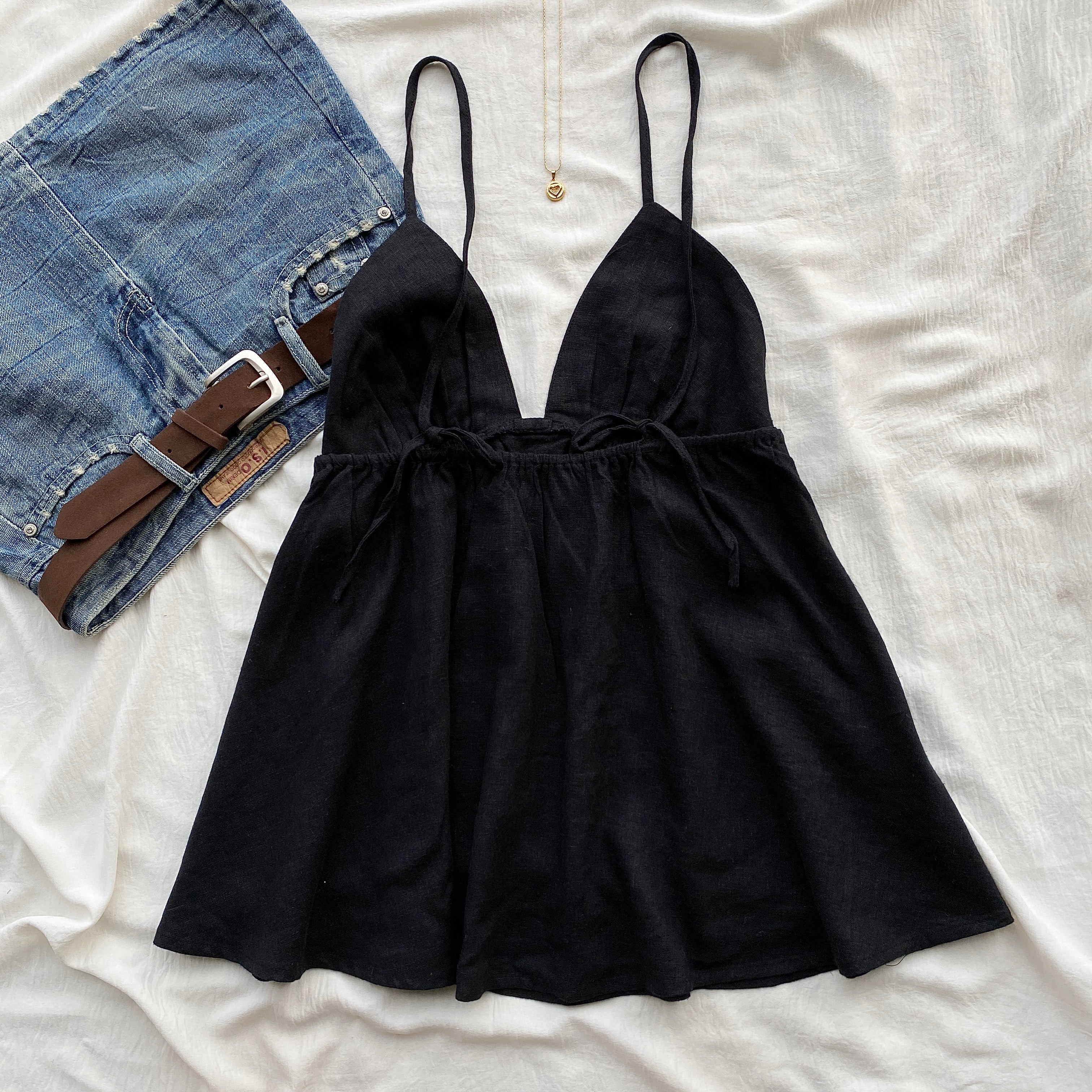 BLACK BABYDOLL TOP FROM FREE PEOPLE (Sizes available)