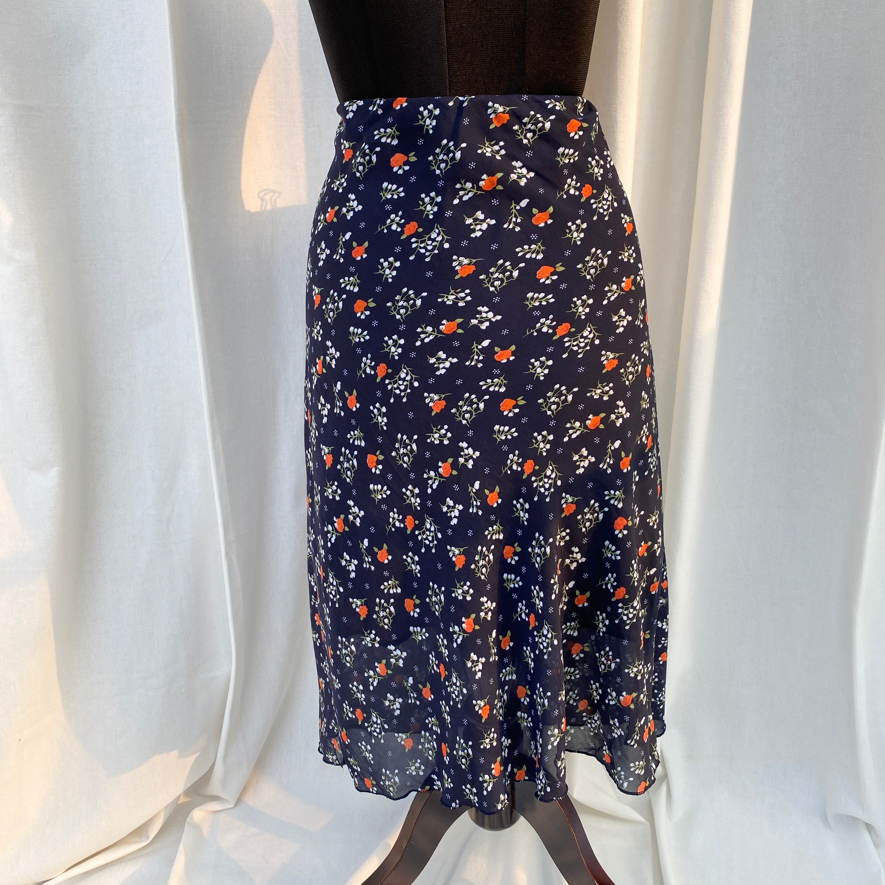 BLUE FLORAL SKIRT (Waist : 26-34)