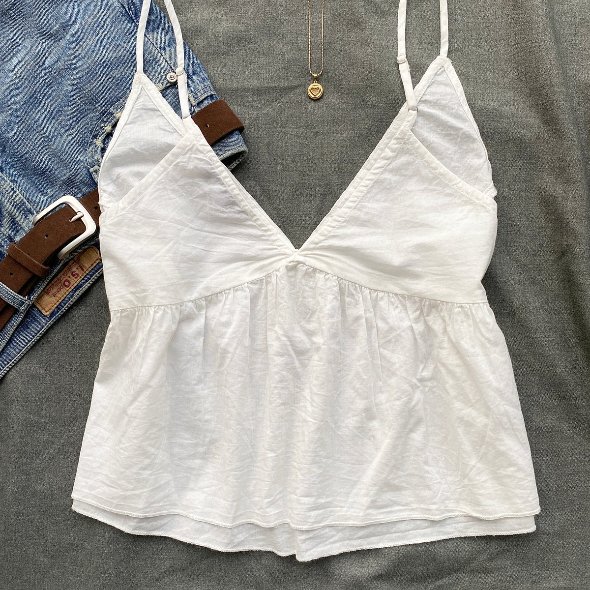 WHITE STUDDED TOP FROM URBAN OUTFITTERS (Sizes available)