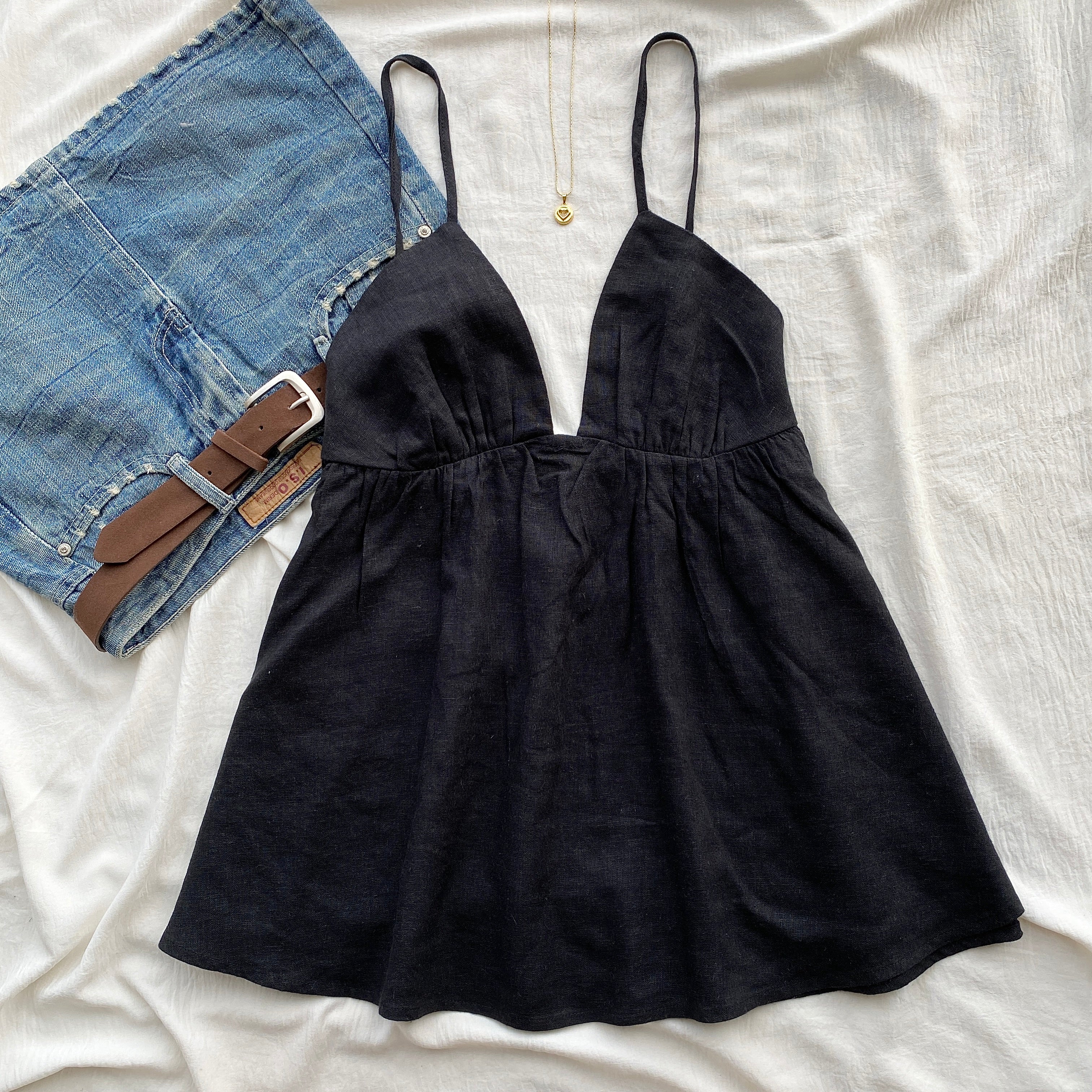 BLACK BABYDOLL TOP FROM FREE PEOPLE (Sizes available)