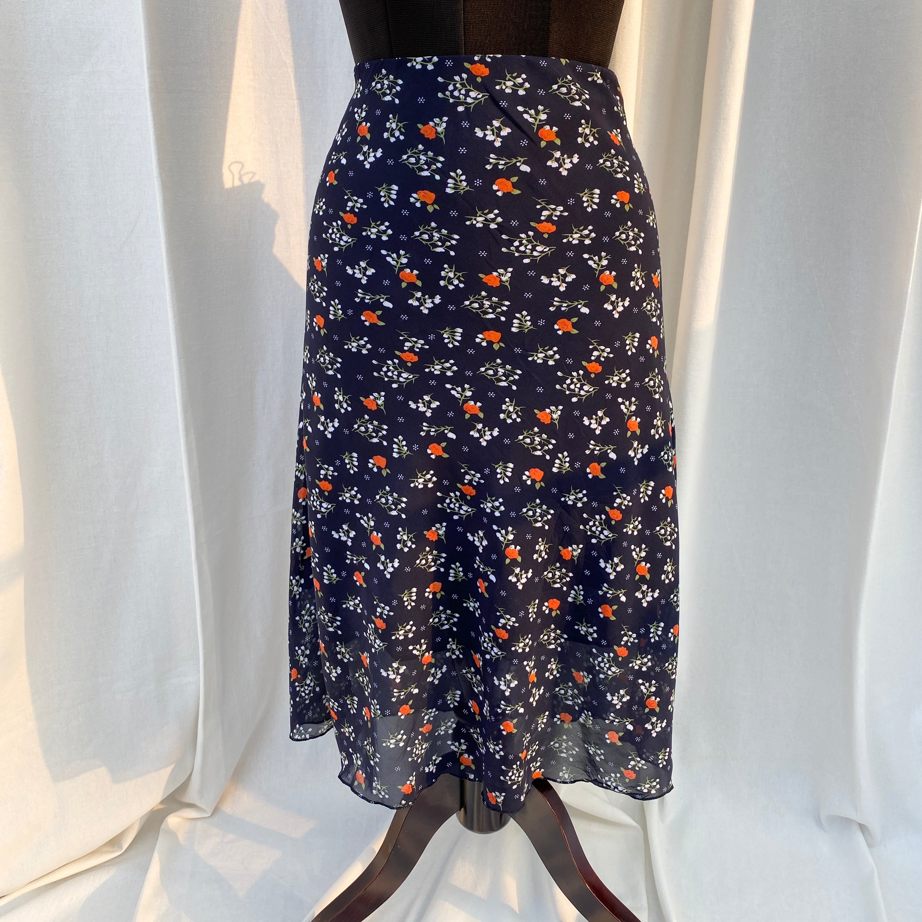 BLUE FLORAL SKIRT (Waist : 26-34)