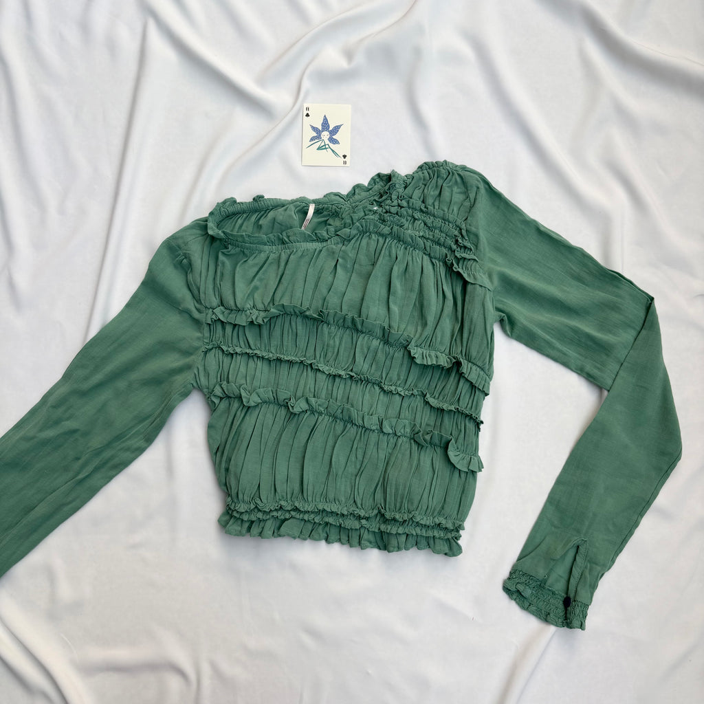 GREEN ASYMMETRIC RUFFLE TOP FROM FREE PEOPLE