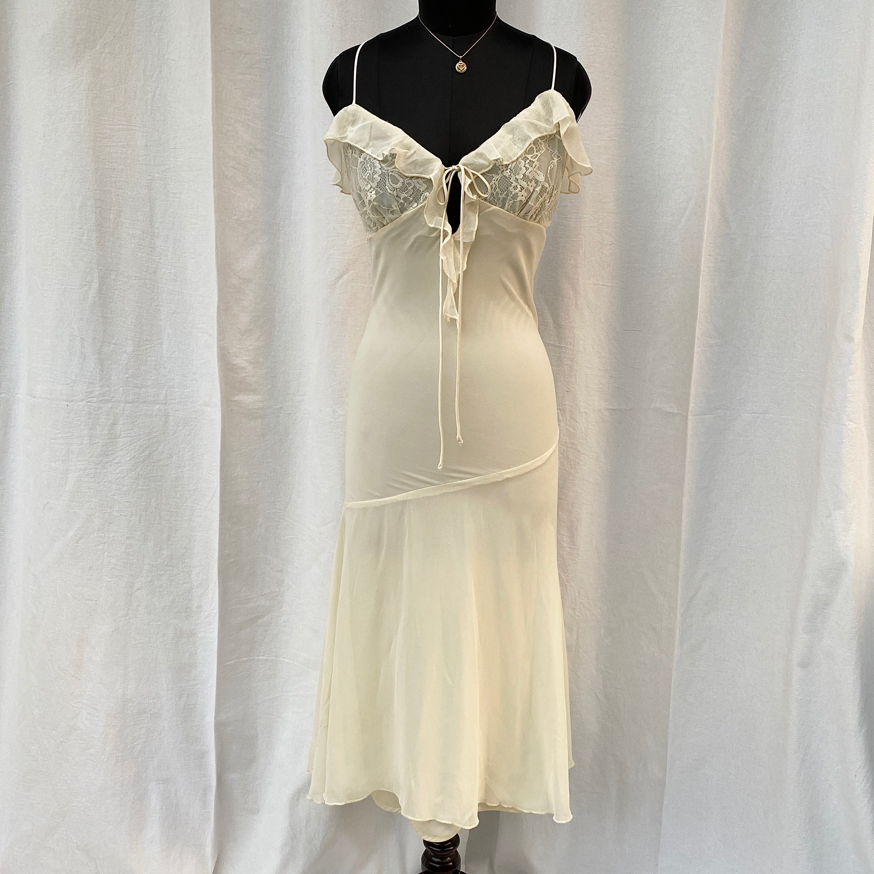 CREAM RUFFLE DRESS FROM URBAN OUTFITTERS (Two sizes)