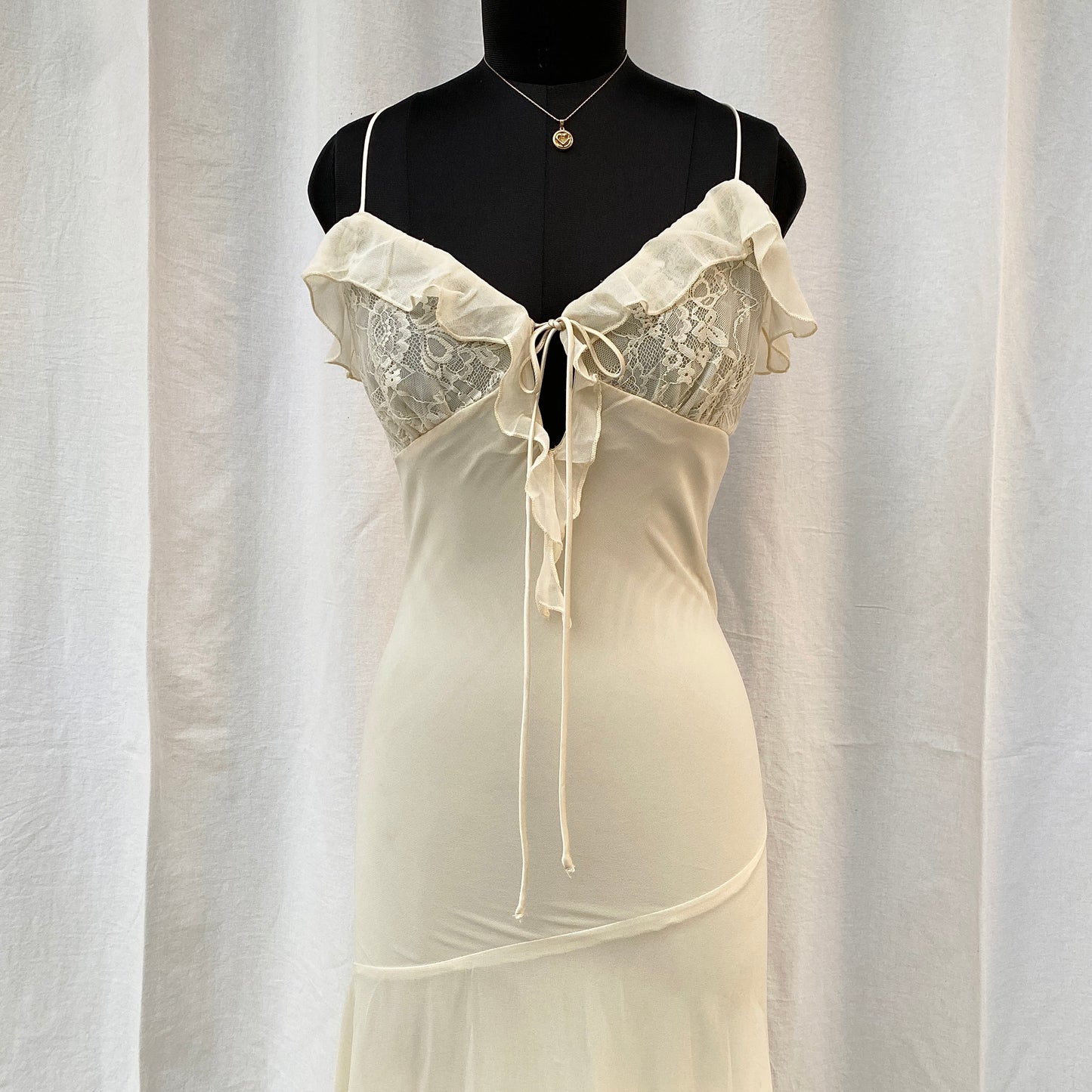CREAM RUFFLE DRESS FROM URBAN OUTFITTERS (Two sizes)